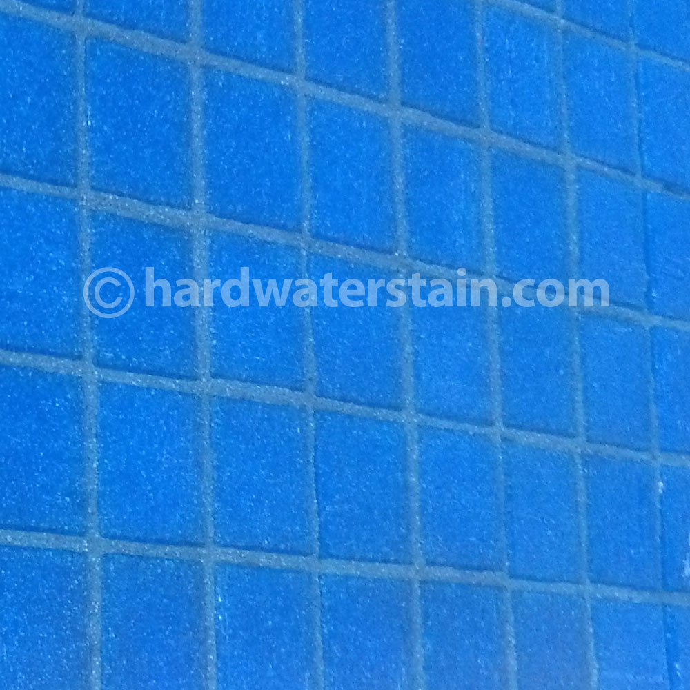 clean glass swimming pool tile